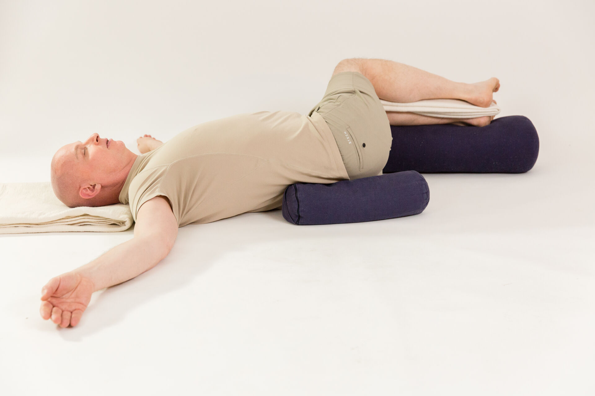 Asana Yin Yoga Haltung: die Drehung